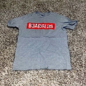 Barley used, comfortable grey shirt, logo borders.